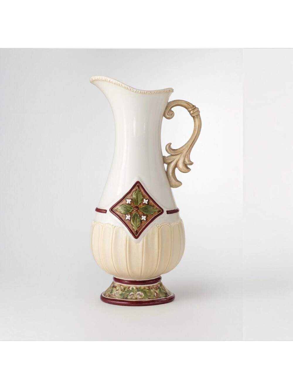 Vintage-Inspired Ceramic Pitcher with Ornate Handle and Floral Detailing